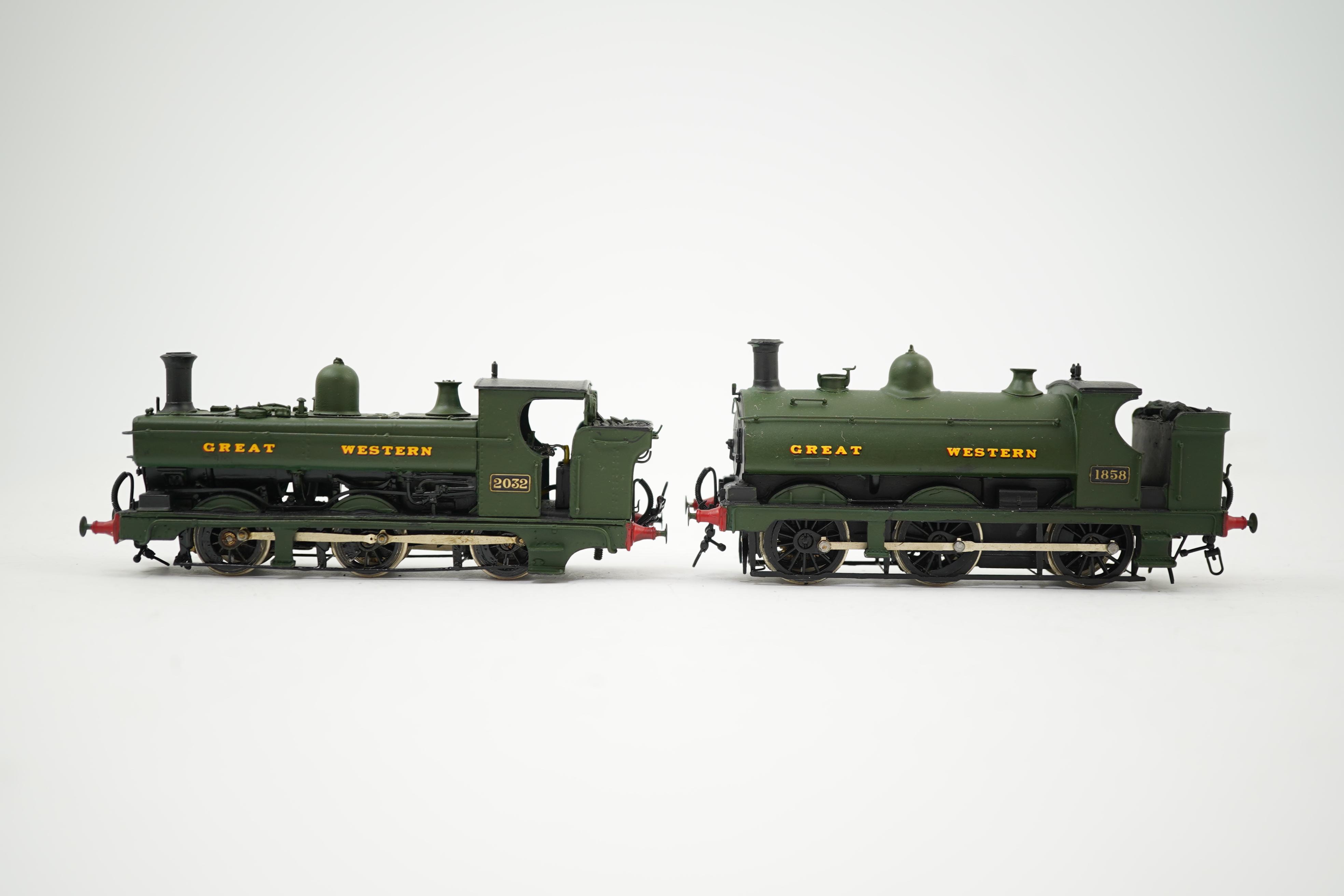 Two 00 gauge brass and white metal kit built GWR tank locomotives; a 2021 class 0-6-0PT, 2032, together with an 1854 class 0-6-0ST, 1858, constructed, painted and lined to a high standard, both motored for two rail opera